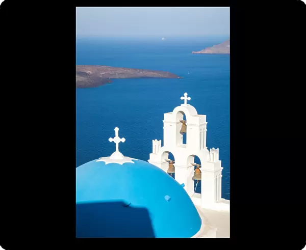 Iconic blue cupola over the sea Santorini Greece