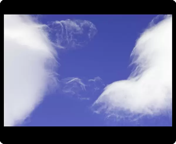 Dramatic clouds in blue sky, South Georgia Island