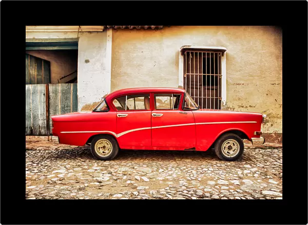 Old classic red car in Cuba