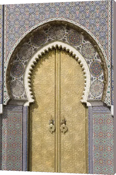 Morrocco, Fez, decorative arched doorway inlaid with tiles
