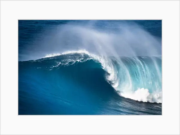 Huge ocean wave breaking on the North Shore of Maui