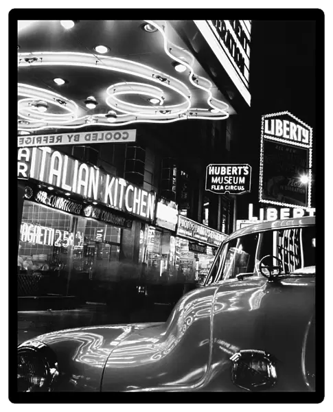 Car and Neon Lights in New York City
