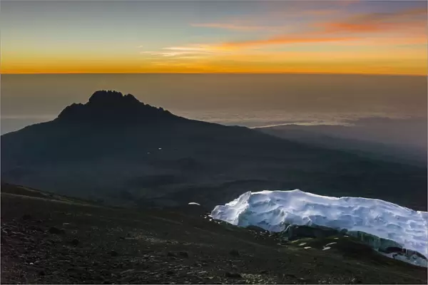 Scenic sunrise view of glaciers at Uhuru Peak, Kibo, with Mawenzi in the background, Mount Kilimanjaro, Kilimanjaro Region, Tanzania