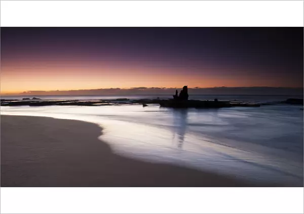 Peaceful ocean landscape photo at first light on the coastline of Durban, Kwazulu-Natal, South Africa
