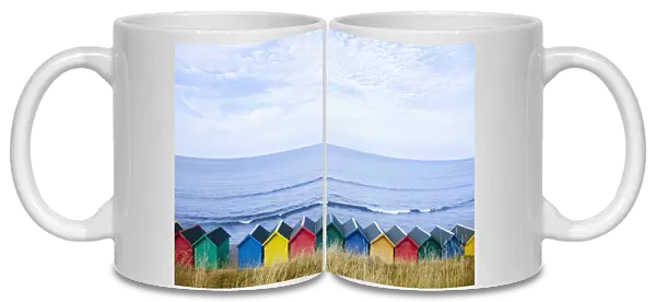 Colourful beach huts along the seafront