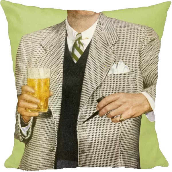 Man in Suit Holding Beverage