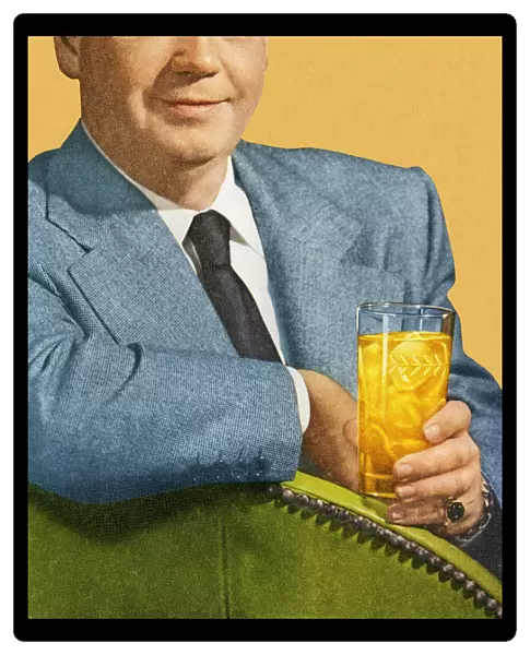 Man Sitting and Holding Drink