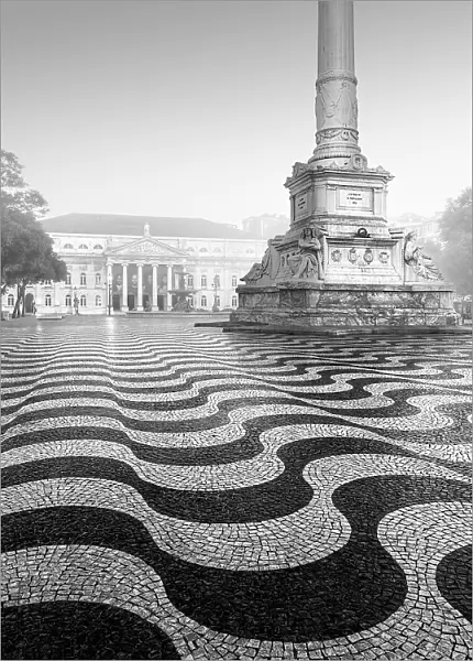Black and white photograph of the Praca Dom Pedro with the famous wave pattern in Lisbon, Portugal