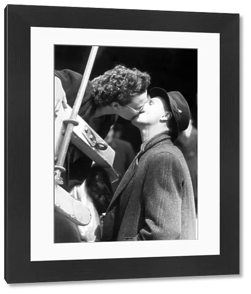 A kiss on board SS Winchester Castle, the immigration ship chartered by the South