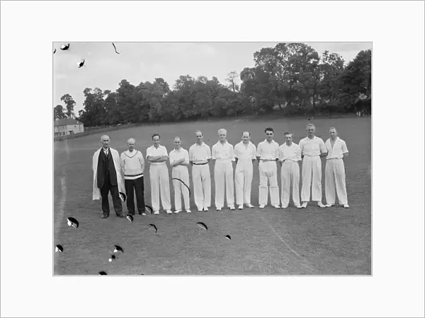 Cricket scenes in Wilmington, Kent. Veteran cricketers stand in a line