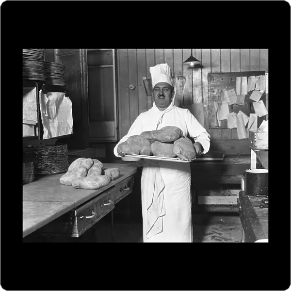 M Latry, the famous chef at the Savoy Hotel, with haggis in readiness for the