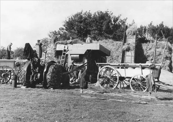 Agricultural Machinery : Harvesting in Sussex, England - Threshing operations on a small holding