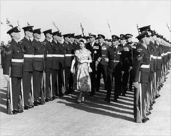 Queen Elizabeth II and Duke of Edinburgh inspects guards in Tobruk May 1954