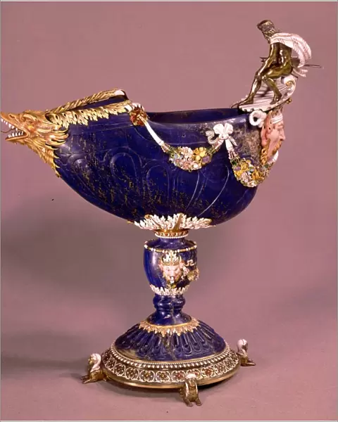 Cup in lapis lazuli surmounted by Neptune in silver garlands of ceramic and enamelled flowers