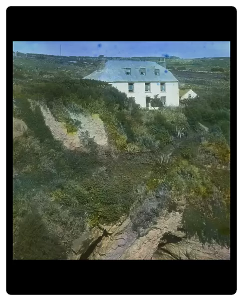 House above the cliff at the back of Bessies Cove, Prussia Cove, St Hilary, Cornwall. Around 1925