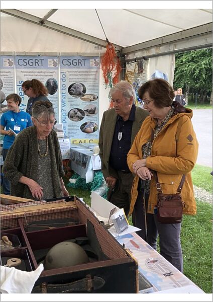Courtney Library staff talk to visitors at the Royal Cornwall Show, Royal Cornwall Showground, Whitecross, Wadebridge, Cornwall. 7th June 2018