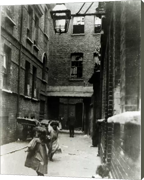 Children playing in a slum, 1899 (b  /  w photo)