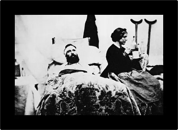 Nurse attending wounded soldiers in hospital, Nashville, Tennessee (b  /  w photo)
