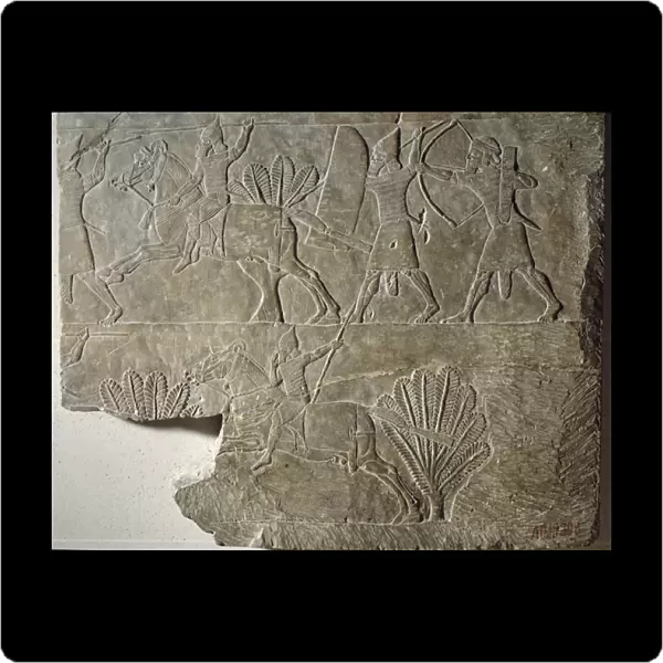 Mesopotamia: Horsemen of the Assyrian army. Low relief in albaster from the palace of