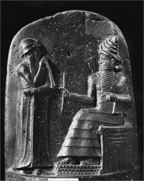 Code of Hammurabi, top of the stele, the god Shamash dictating his laws to Hammurabi