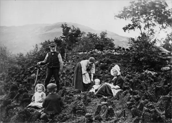 Crofting Family Cutting Peat, (b  /  w photo)