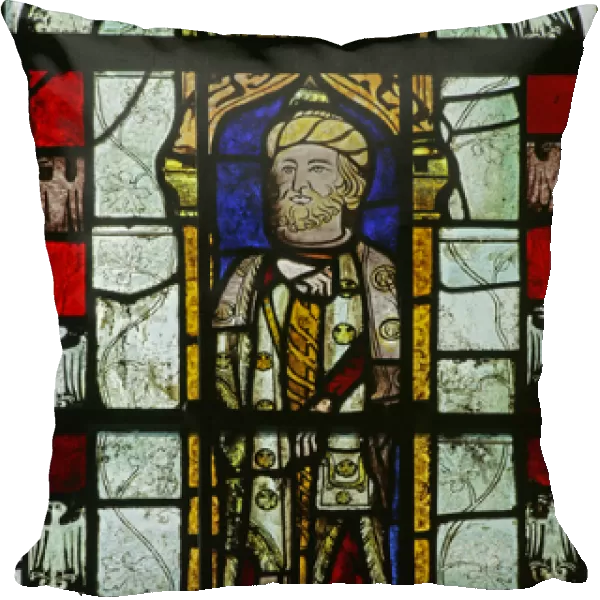 Figure with unusual headgear and heraldic eagles (stained glass)