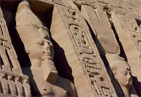 Heads of Ramesses II (1279-1213) and Hathor  /  Nefertari on the Facade of the Temple of