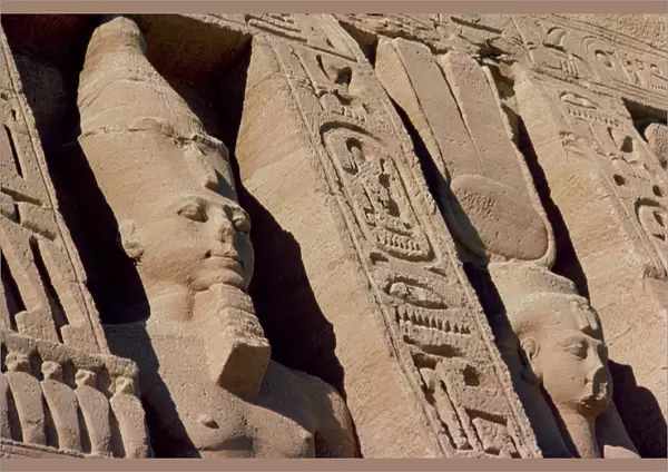 Heads of Ramesses II (1279-1213) and Hathor  /  Nefertari on the Facade of the Temple of