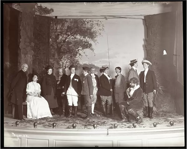 The cast on stage in costume from an amateur production of a play titled