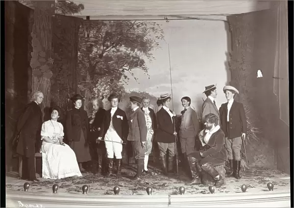 The cast on stage in costume from an amateur production of a play titled