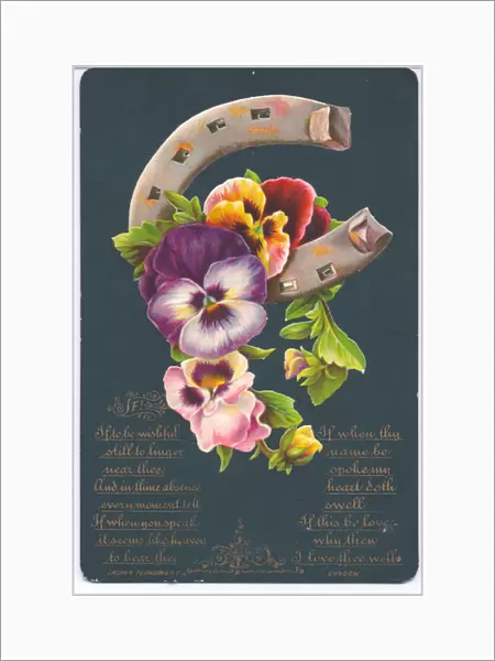 A Victorian good luck greeting card of a horseshoe and pansies, c. 1880 (colour litho)