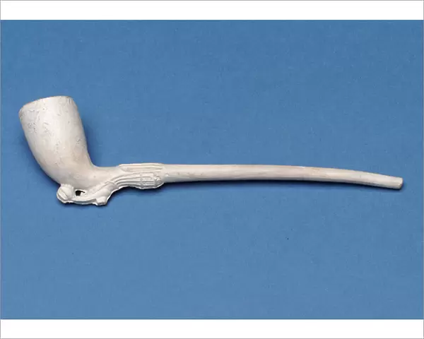 Small pipe with stem in shape of a ladys leg and boot (clay)