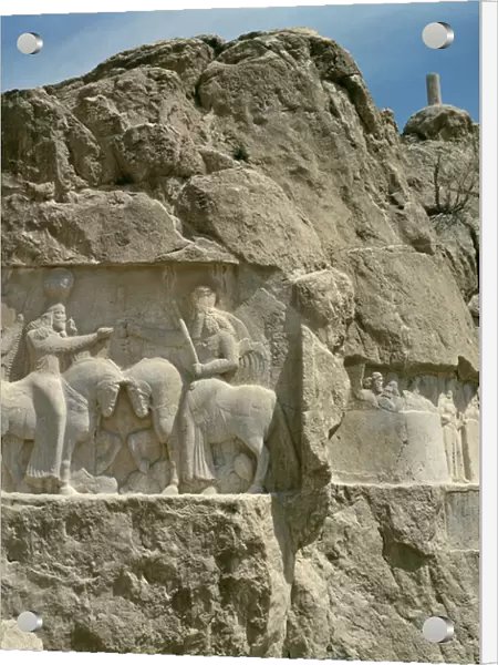 Two bas-reliefs, the left with the investiture of Bahram I (r