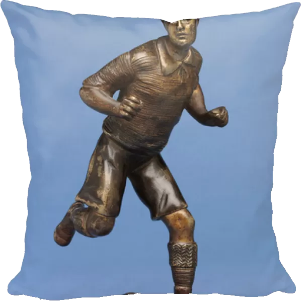 Footballer running with the ball, c. 1900 (bronze)