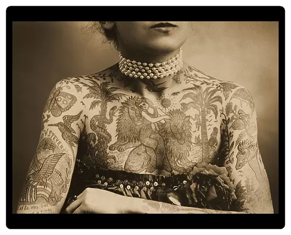 Portrait of a tattooed woman, c. 1905 (Sepia Photo)