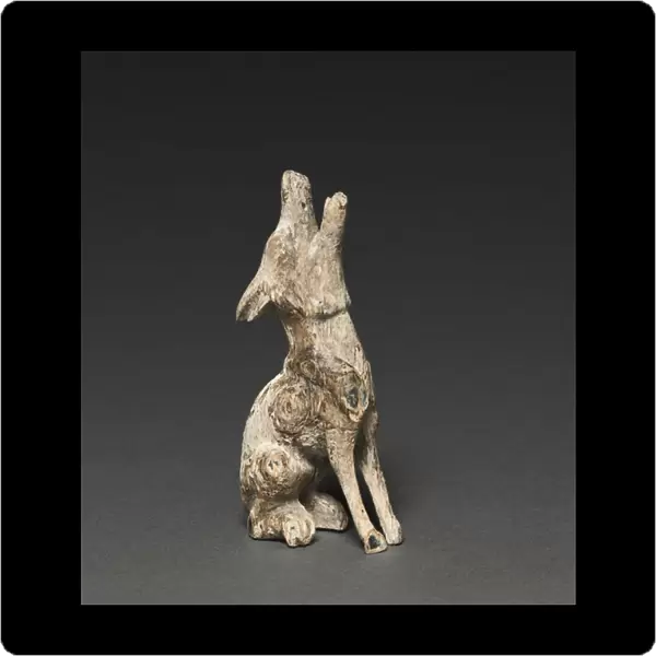 Howling Wolf, c. 500-200 BC (wood with shell inlays)
