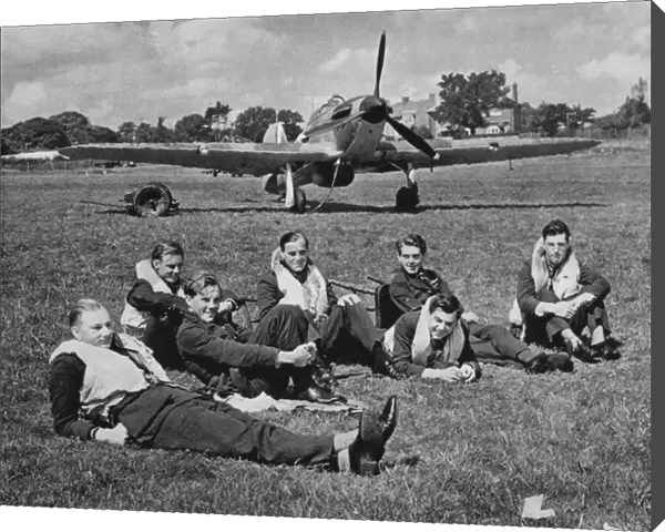 Fighter pilots resting between battles, autumn afternoon, England, 1940 (b  /  w photo)