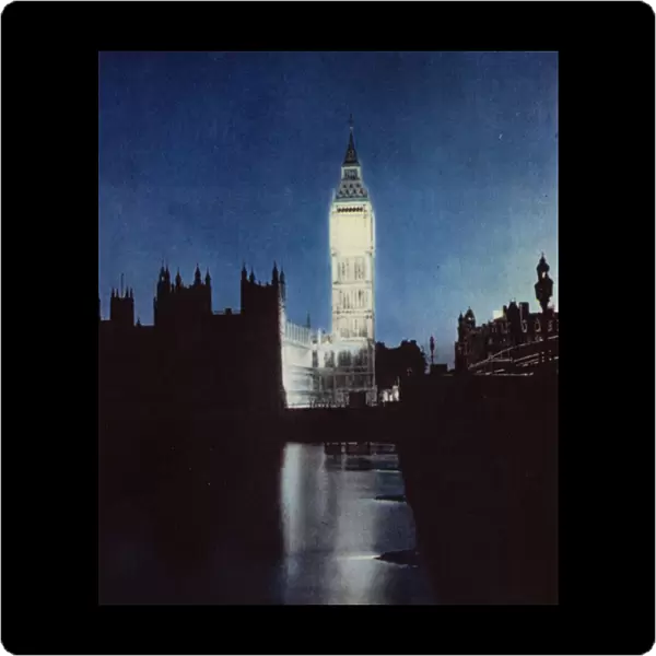 Big Ben, the clock tower of the Houses of Parliament in London floodlit on the night of VE Day, 8 May 1945, having been subject to the blackout in force during World War II (photo)