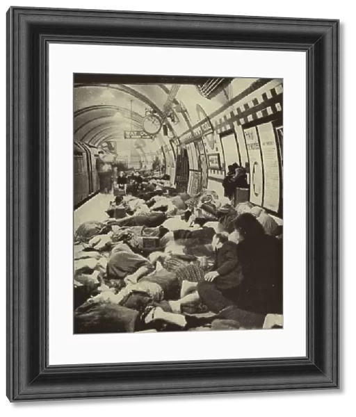 Londoners sheltering from a German air raid on a platform in Piccadilly Underground Station during the Blitz, World War II, September 1940 (b  /  w photo)