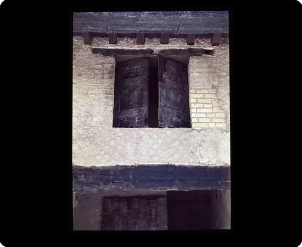 View of a carbonized window of a house of the porch of the decunamus maximus