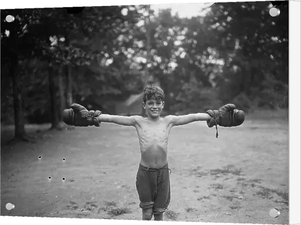 Young Boy with Boxing Gloves, 1926 (b / w photo)
