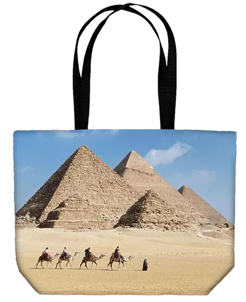 Camel riding at the pyramid complex, Giza, Egypt, 2020 (photo)