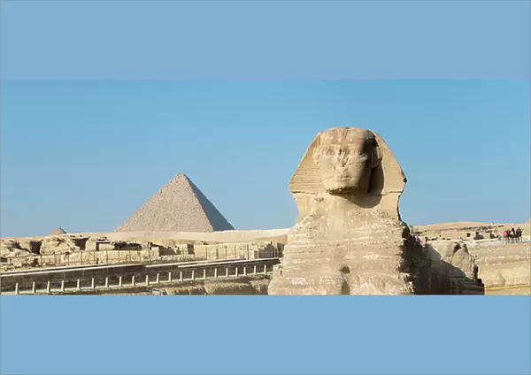 The great Sphinx with the pyramid of Menkaure in the background, Giza, Cairo, Egypt, 2020 (photo)