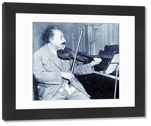 Albert Einstein playing his violin (b / w photo)