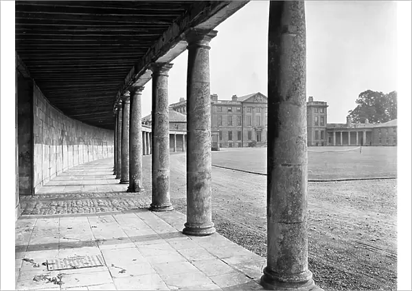Looking through the colonnade to the entrance facade, Burley-on-the-Hill, Rutland, from The Country Houses of Sir John Vanbrugh by Jeremy Musson, published 2008 (b / w photo)