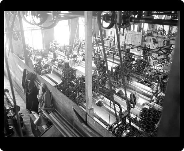 Paterson, New Jersey - Textiles. Idle quilling machines and looms in a cockroach shop