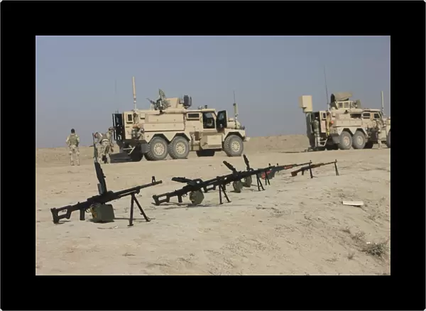 Firearms sit ready on a firing range in Kunduz, Afghanistan