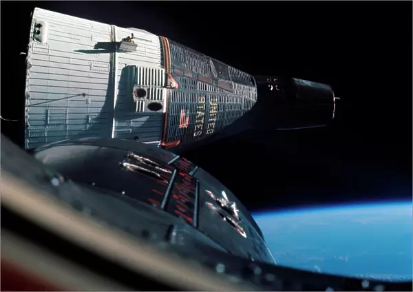 The Gemini 7 spacecraft in Earth orbit