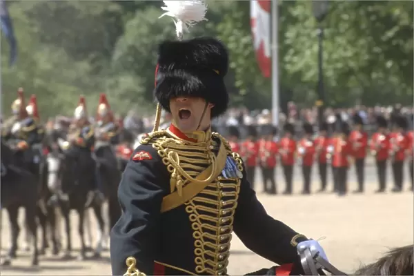 An officer shouts commands during the Trooping the Colour ceremony in London, England