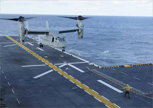 An MV-22 Osprey lands aboard the amphibious assault ship USS Iwo Jima